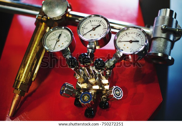 gas gauge
pressure gauge on a red
background