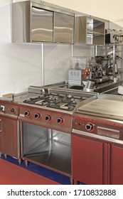 Gas Hob Stove And Grill Fryer In Restaurant Kitchen