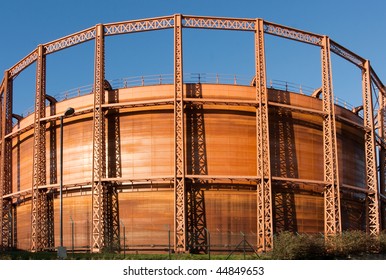 Gas Holder Against A Deep Blue Sky