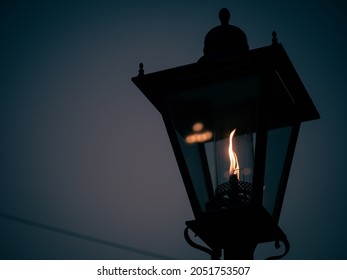 A Gas Lamp At Dusk In Autumn.