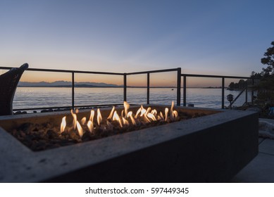 Gas Lit Fireplace By The Sea At Sunset