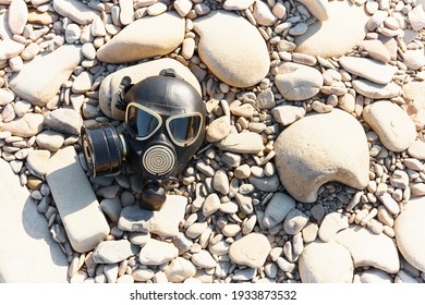 Gas Mask On The Stone Beach