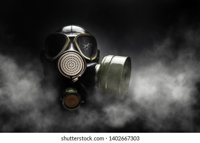 Gas Mask In Smoke. Cracked Safety Glass. Bullet Hole. Poisoned Territory. Means Of Protection Of Respiratory Organs. Chemical Protection.