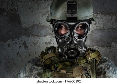 Gas Mask Soldier Looking At Camera