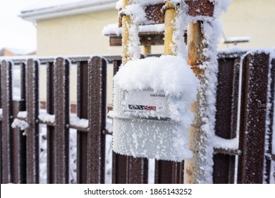 Gas Meter Covered With Snow And Frost. Frozen Gas Meter On The Street.