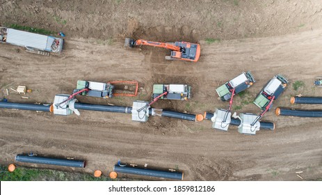 Gas And Oil Pipeline Construction. Pipes Welded Together. Big Pipeline Is Under Construction. Aerial View