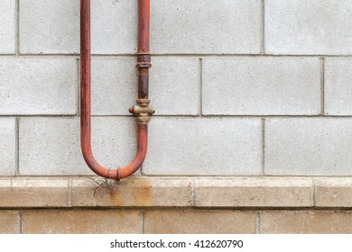 Gas Pipe On A House Wall