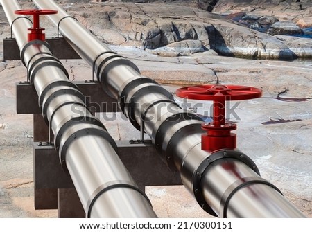 Gas pipeline. Two gas pipes with red valves. Pipeline for transfer of hydrocarbons. Steel pipeline on rocks. Gas start and import concept. Sale of propane and methane. 