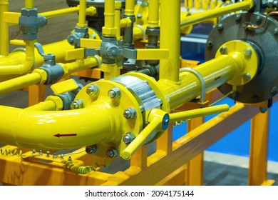 Gas Pipes Of Yellow Light. Gasification Pipeline. Gasification Of Industrial Enterprise. Boiler Station Of Gas Processing Factory. Gas Pipes With Many Taps And Connections. Pressure Reducing Valves