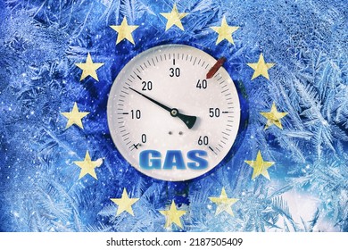 gas pressure gauge on background of frozen flag of European Union, energy crisis in European countries in the winter season, transition to renewable energy sources, the increase in natural gas prices