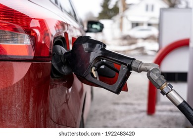Gas Pump Nozzle In A Car