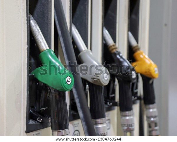 Gas pump nozzles in\
service station