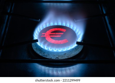 Gas Ring Burner And Euro Sign, European Money Symbol On Home Gas Stove. Blue Propane Flame And Currency. Concept Of Energy Crisis, Europe Economy, Oil, Expensive Cost, Sanctions, Payment And Saving.