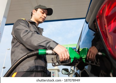 Gas Station Attendant At Work