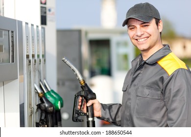 Gas Station Attendant At Work 