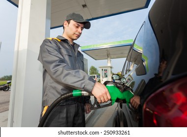 Gas Station Attendant At Work