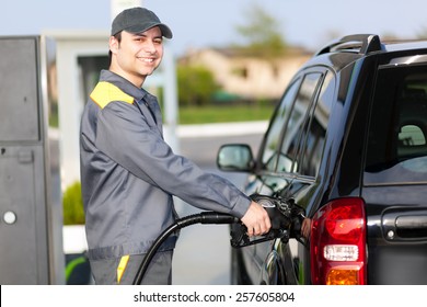 Gas Station Attendant At Work