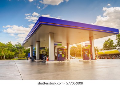 Gas station with clouds sky and sun light