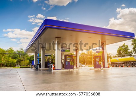 Gas station with clouds sky and sun light