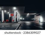 Gas station at foggy night.