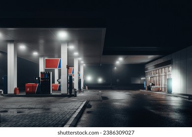 Gas station at foggy night.
