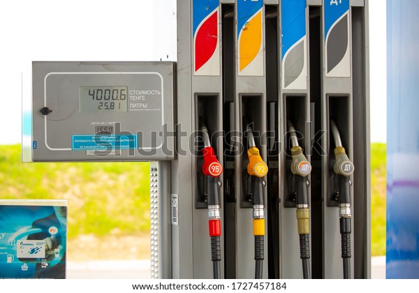Gas station.\
Refueling pistols close-up. Fuel cost. Diesel and gas prices.\
Almaty, Kazakhstan, May 5,\
2020