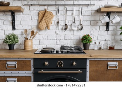 Gas Stove, Built In Oven Equipment, Kitchenware Supplies And Houseplant In Flower Pot. Wooden Kitchen In Apartment With Modern Interior And New Furniture