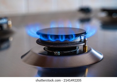 Gas stove on, gas supply and energy dependence.
 - Shutterstock ID 2141492205