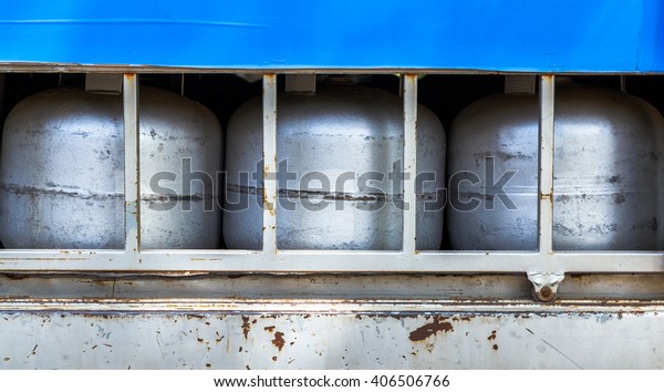 gas tanks inside truck\
container