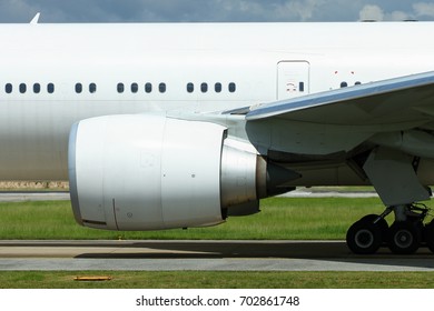 Gas Turbine Engine In Active, Partial Cropped Image Of A Commercial Airliner On A Sunny Day, Aircraft Power Plant In Air Travel Theme. 