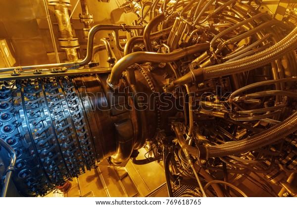 Gas turbine engine of feed gas compressor\
located inside pressurized enclosure, The gas turbine engine used\
in offshore oil and gas central processing platform. Technological\
ecological installation