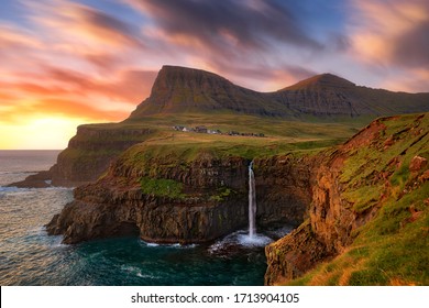 Gasadalur Waterfall Into The Ocean In Faroe Islands