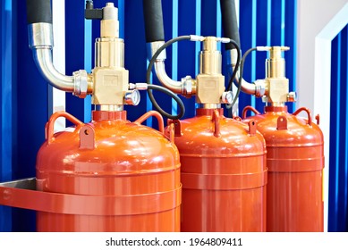 Gaseous fire suppression modules storage containers with shut-off device and valve - Shutterstock ID 1964809411