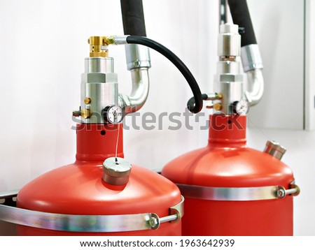 Gaseous fire suppression modules storage containers with shut-off device and valve