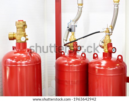 Gaseous fire suppression modules storage containers with shut-off device and valve