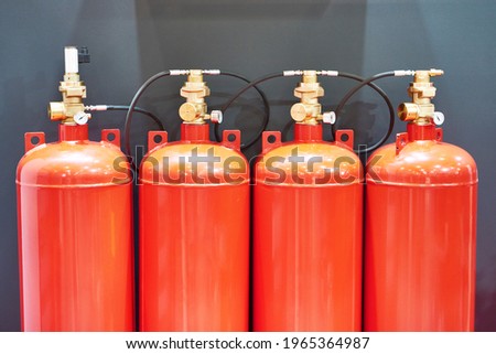 Gaseous fire suppression modules storage containers