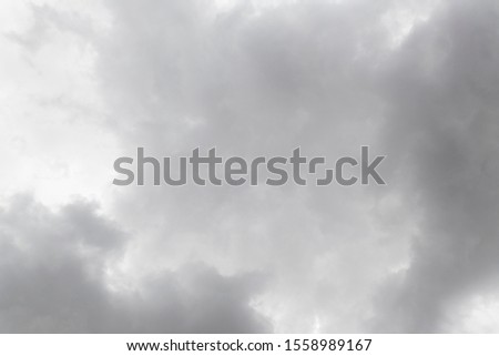 Gaseous texture with white and gray clouds.