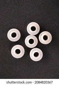 Gasket Or Packing Product Is White With A Circle Made Of Teflon On A Black Background

