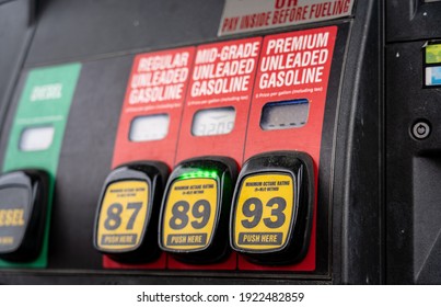 Gasoline buttons on a fuel pump station - Shutterstock ID 1922482859