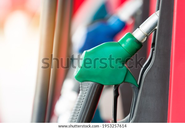 Gasoline dispenser at the gas station.\
Close Up of colourful fuel pumps at the station\
oil