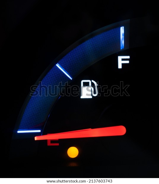 Gasoline Gauge on a Modern Automobile with the\
Needle Showing Empty
