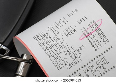 Gasoline Reciept With High Price Circled In Red With Car Keys