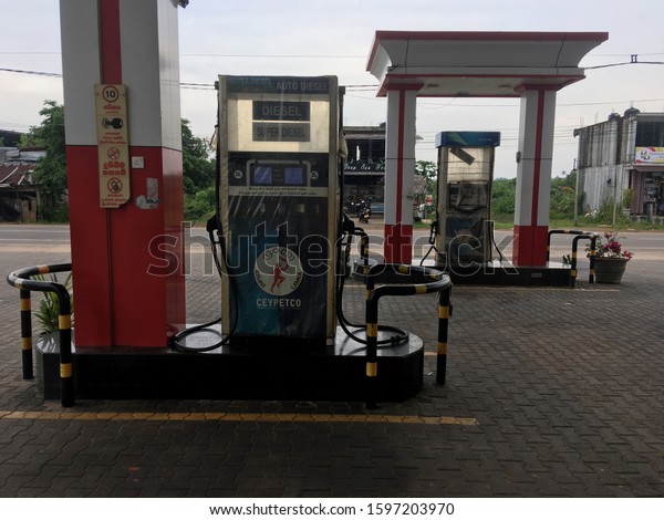 Gasoline station in tropical city . Sri\
Lanka, Hikkaduwa,2019.