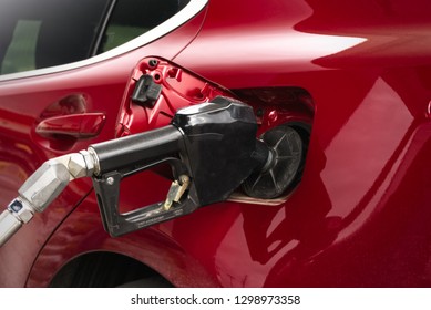 Gassing Up A Red Car                              