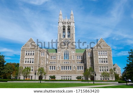 Gasson Hall with Collegiate Gothic style at the quad in Boston College. Boston College is a private university established in 1863 in Chestnut Hill, Newton, Massachusetts MA, USA.