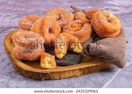 Gastronomic Still Life: Aniseed Donuts on Slate and Kitchen Towel