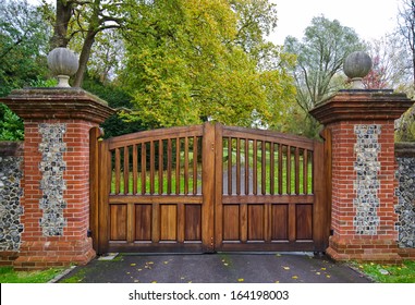 Gate And Driveway Of A Country Mansion