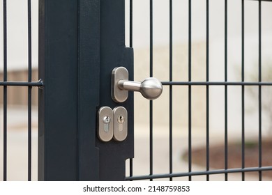 Gate Lock On Metal Fence.  Modern House Gate Handle. Doorknob. 