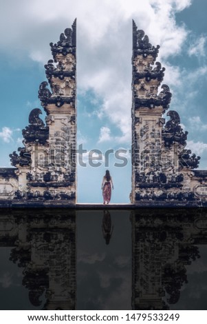 The gate overlooking the volcano of Pura Penataran Agung Lempuyang is a Balinese Hindu temple or Pura located on Mount Lempuyang hill in Karangasem Bali. Indonesia
