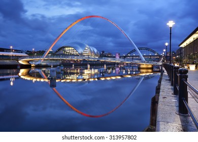 The Gateshead Millennium Bridge over the river Tyne in Newcastle upon Tyne, England.